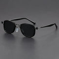 Retro style square frame sunglasses with metal and plastic construction in a black gold full gray colour.