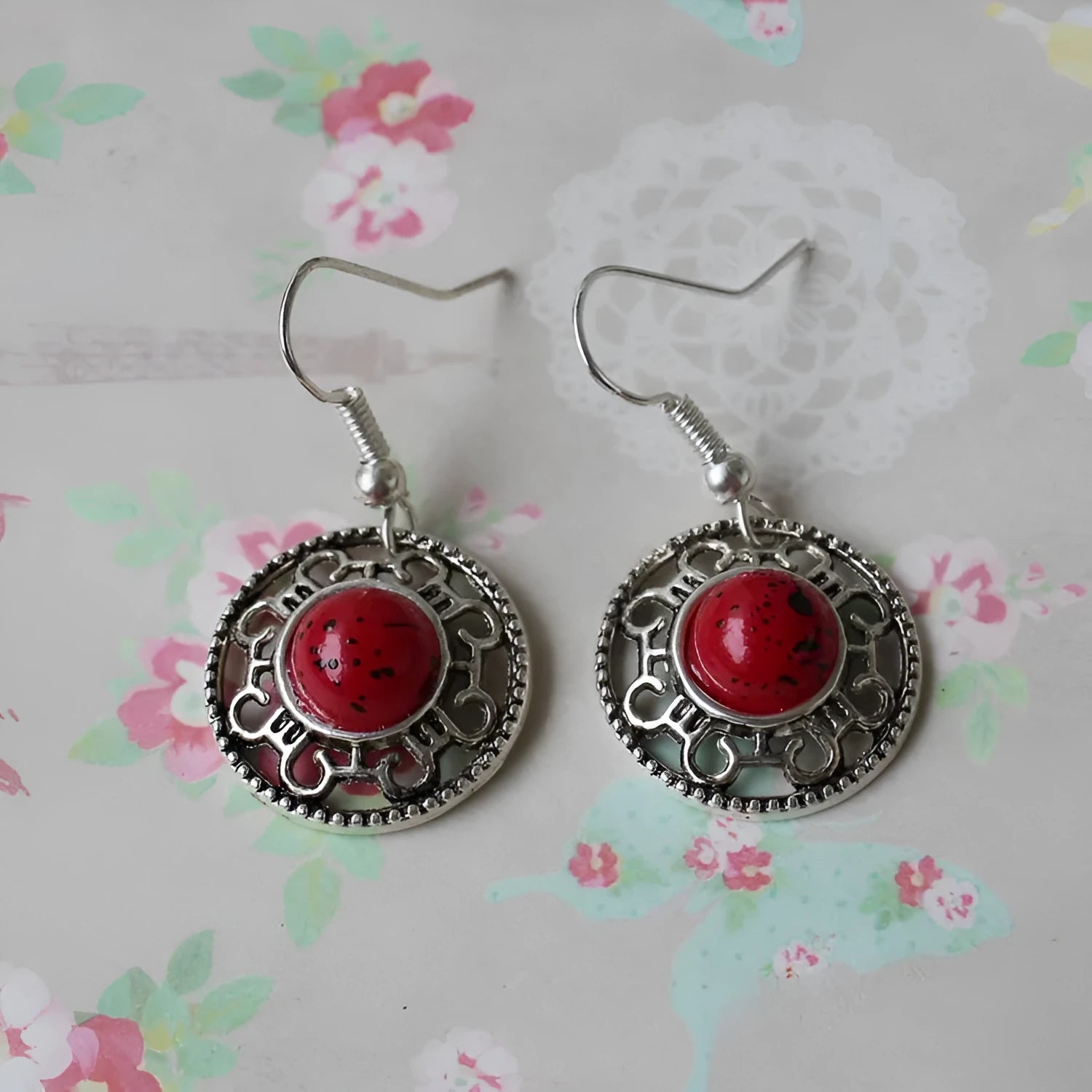 Handmade ethnic Miao silver geometric flower disk earrings with turquoise, in black, blue, or red.