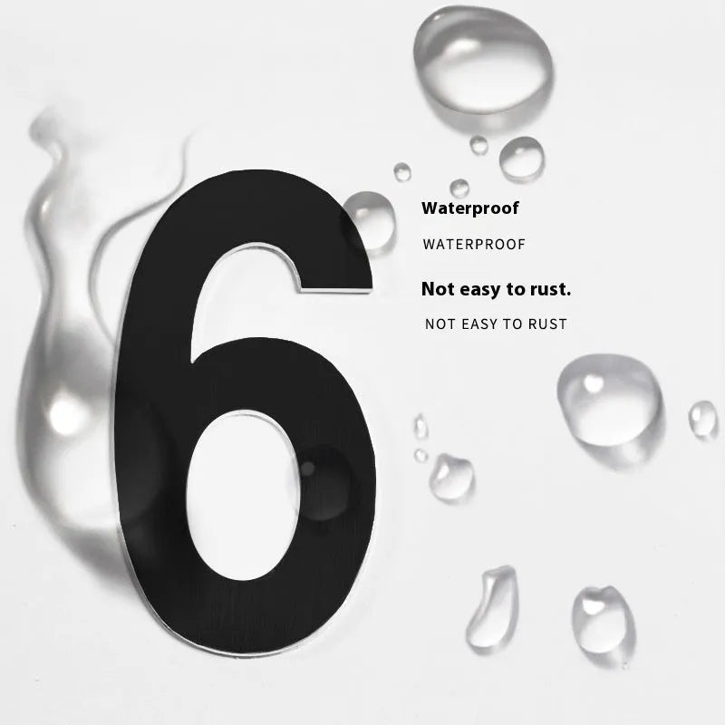 Black stainless steel self-adhesive house numbers and letters, each 7.5cm tall, for external mounting.