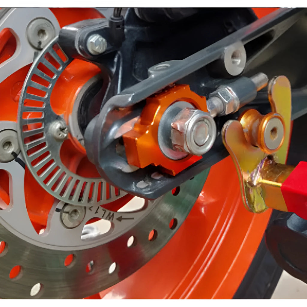 Orange anodised aluminium rear fork regulators for KTM Duke 200 390 990 motorcycles