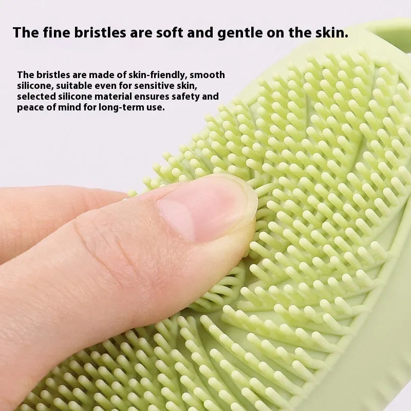 Creative silicone bath brush storage bottle in light grey colour on a bathroom shelf.