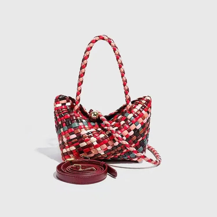 Women's casual woven PU leather shoulder bag showing handmade texture and shoulder strap.