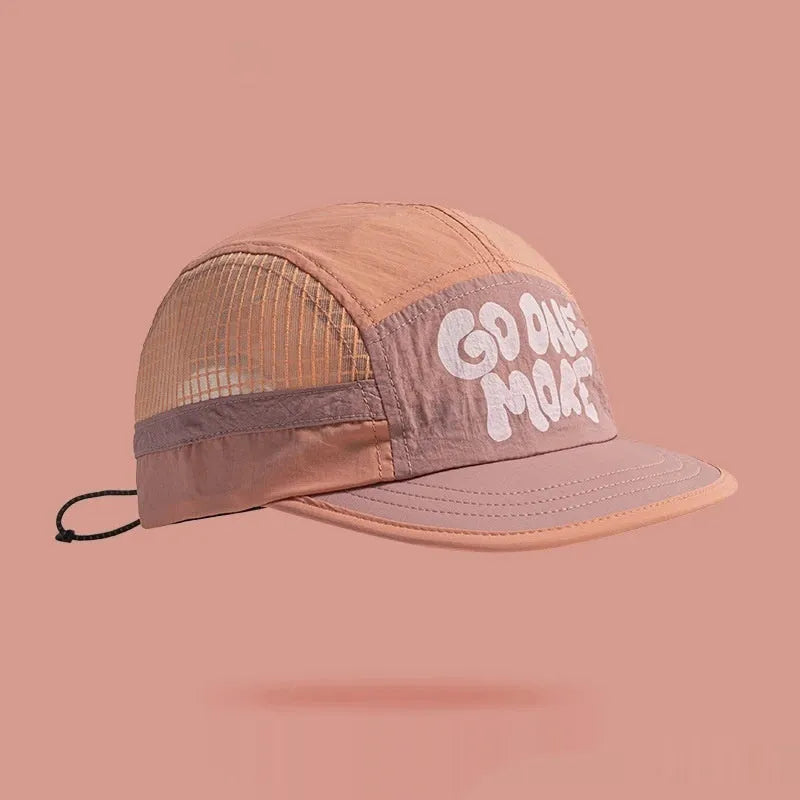 Gradient coloured quick-drying mesh baseball cap with dome crown and printed detail.