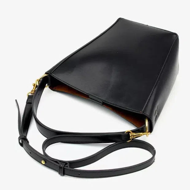 Urban minimalist bucket crossbody bag in army green with front three-dimensional pocket and adjustable strap
