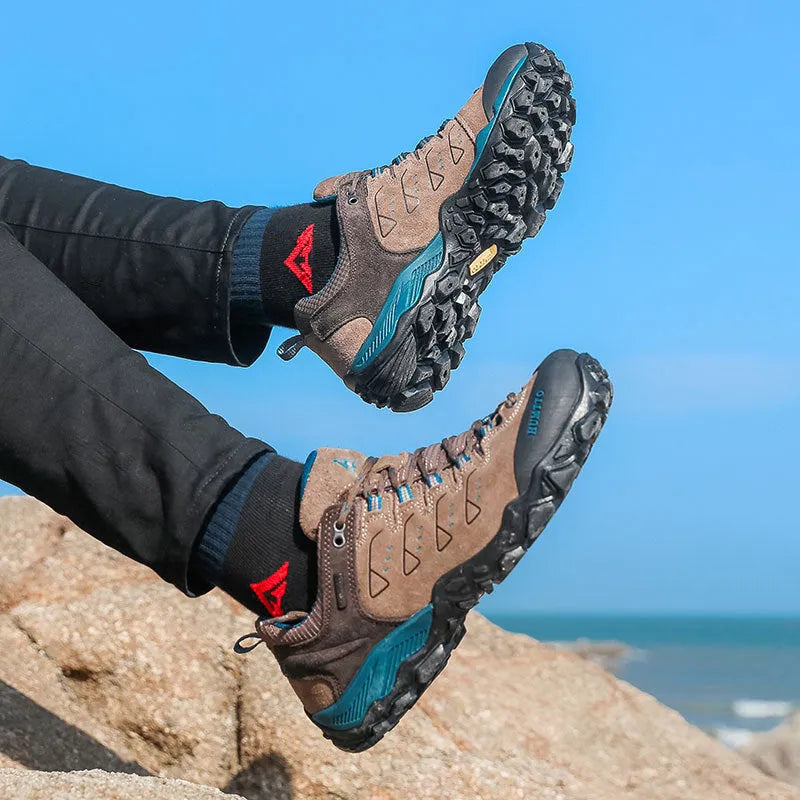 Men's black low top lightweight hiking shoes with EVA outsole and rubber sole on outdoor trail