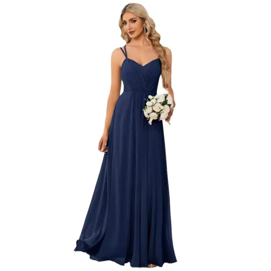 Sleeveless long pleated A-line women's dress in light green polyester fabric, shown on a model.