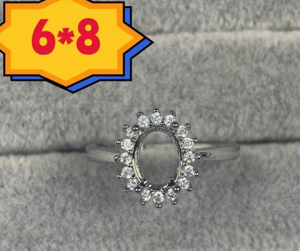Oval denier ring with open mouth design, 6*8mm stone, and five-pointed star decoration