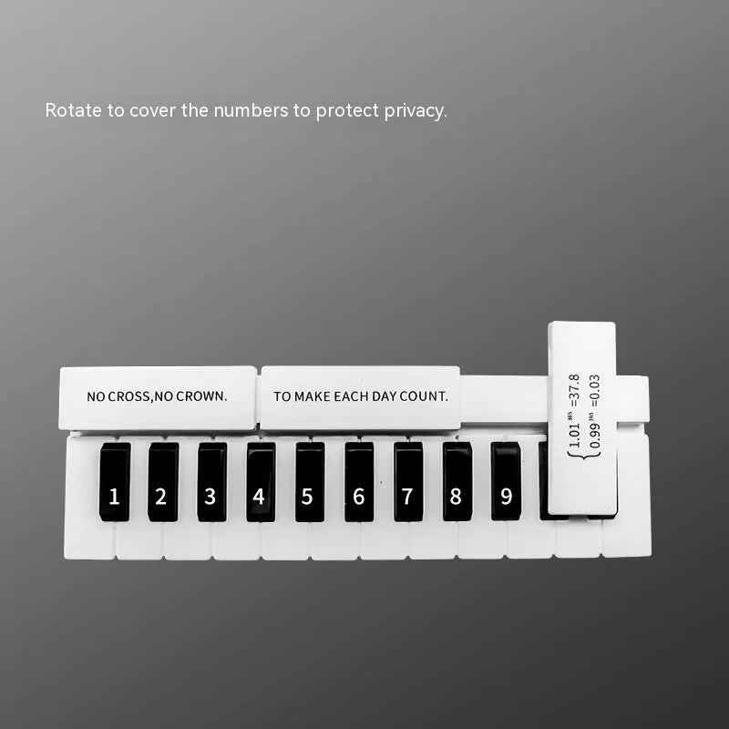 Black and white piano-shaped plastic temporary parking sign for vehicle dashboard