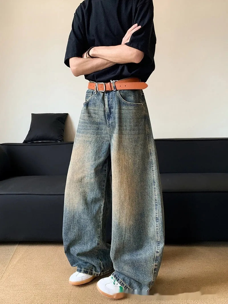 Men's retro blue jeans with distressed machete detailing and slimming wide-leg cut on mid waist design