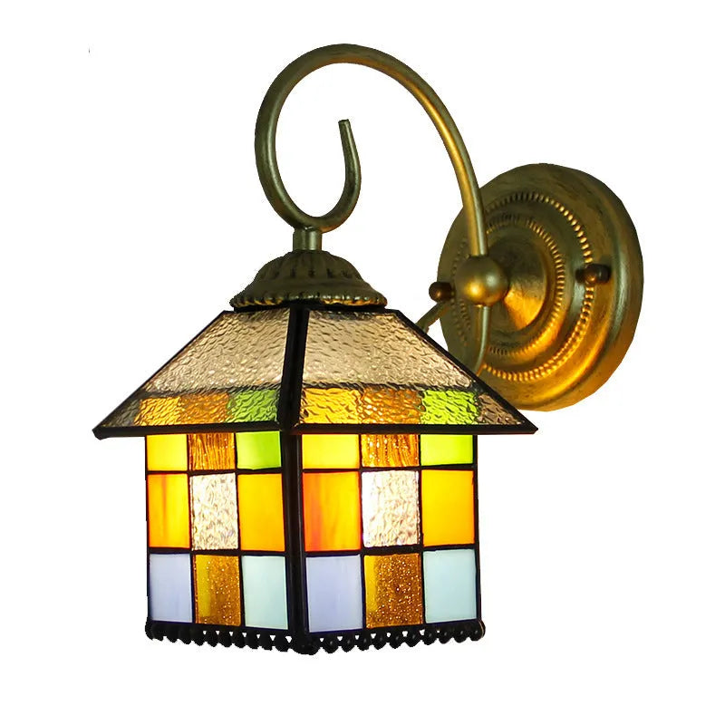 A coloured stained glass wall lamp mounted on a corridor wall, showing one of six available style designs.