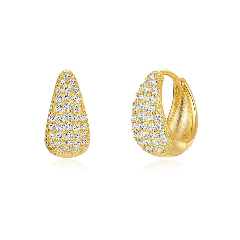 Gold tone brass diamond earclip earrings with geometric round shape and European styling