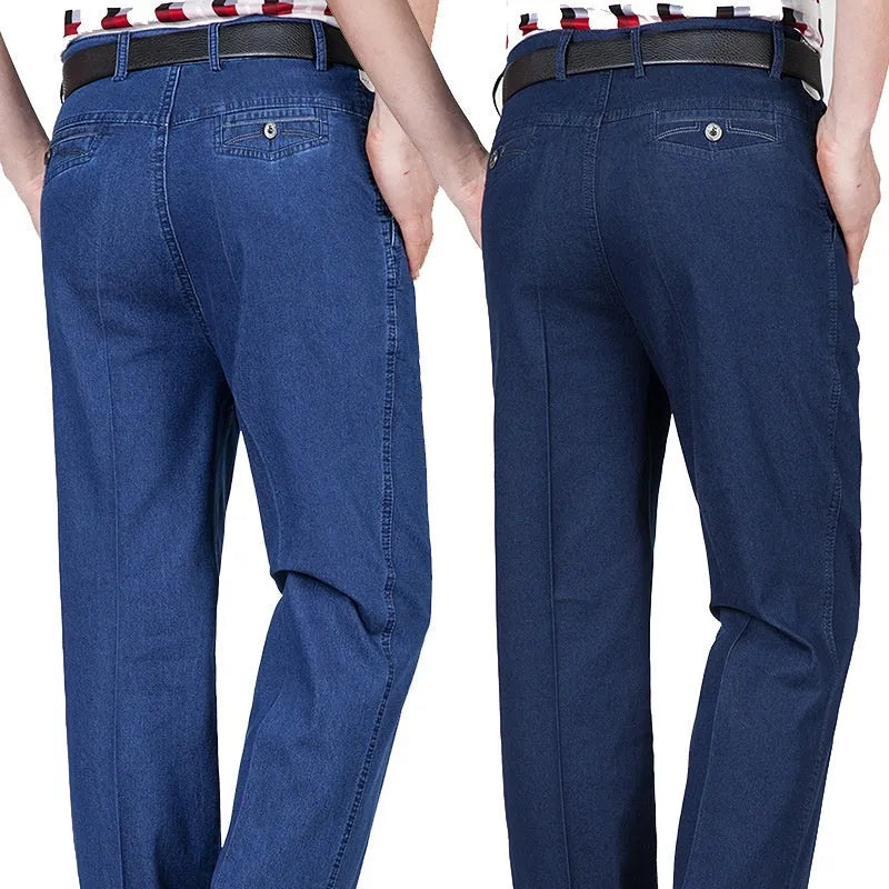 Men's high-waist loose-fit blue denim jeans with a zip fly, shown in light blue.