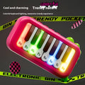 Pocket electronic keyboard toy for children in green or pink, plays little piano patterns for developmental training.