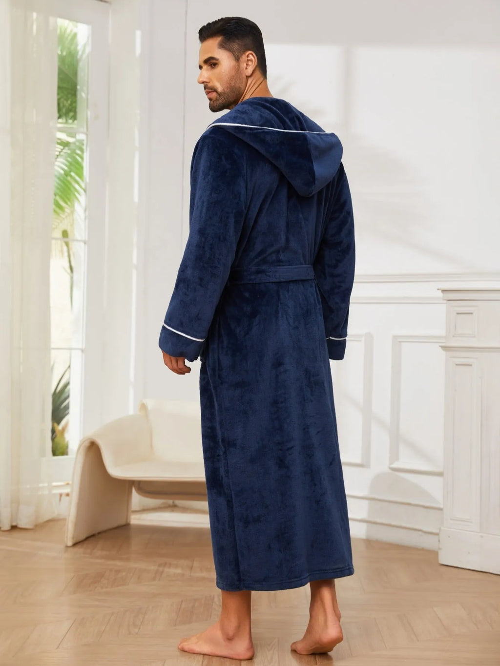 Men's long light grey flannel bathrobe with a European style fit, shown hanging.