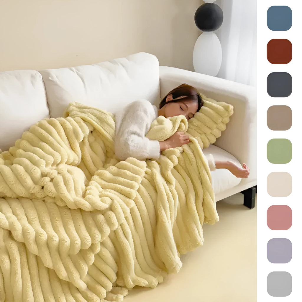 Double-sided bubble velvet blanket in rabbit fur design showing texture detail and solid colour option