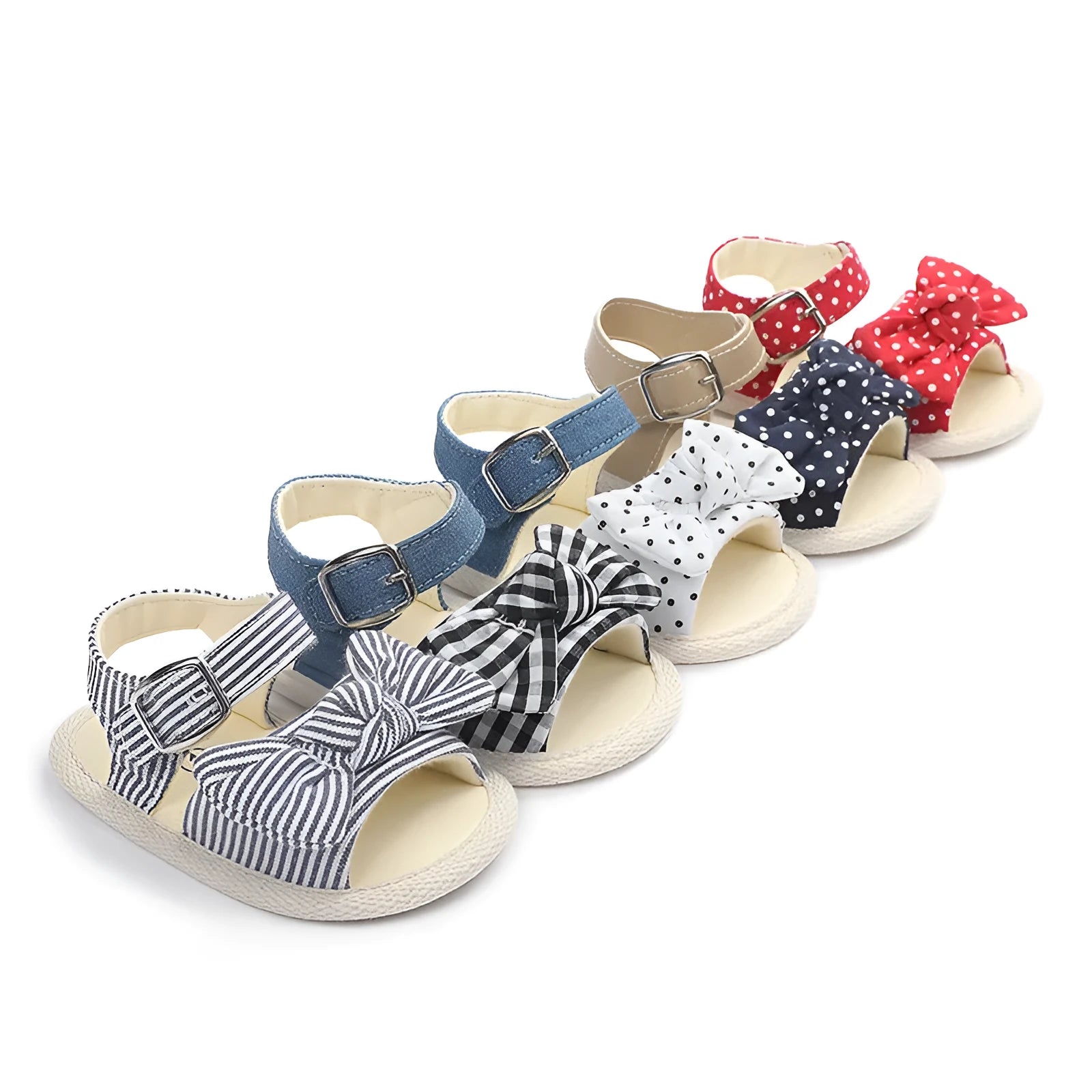 White and black toddler shoes with Velcro strap, showing low tube height design.