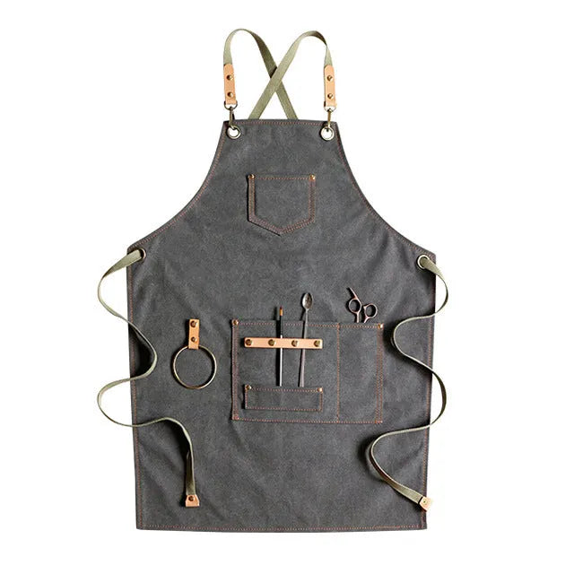 Canvas apron with cross-strap design in camel colour for café work and baking