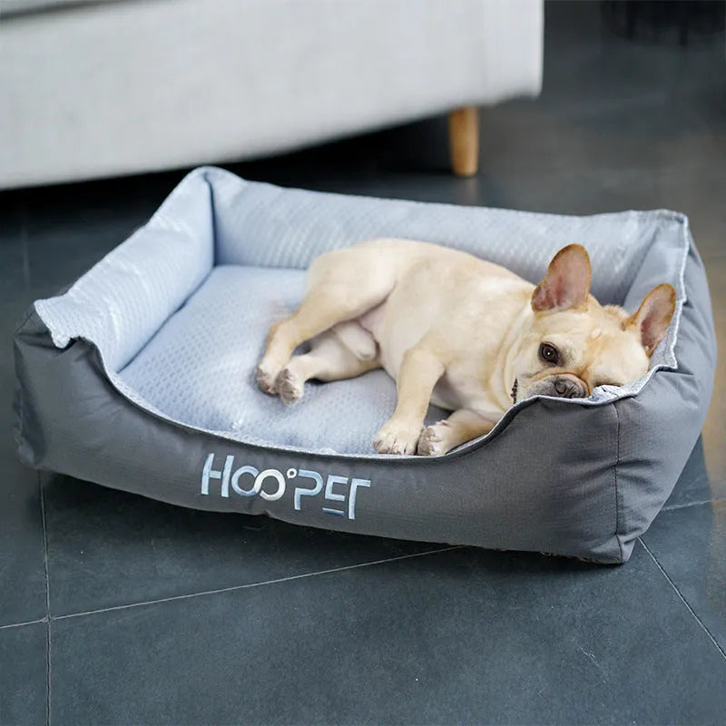Soft grey pet bed with removable cover in small, medium, and large sizes for dogs and cats.