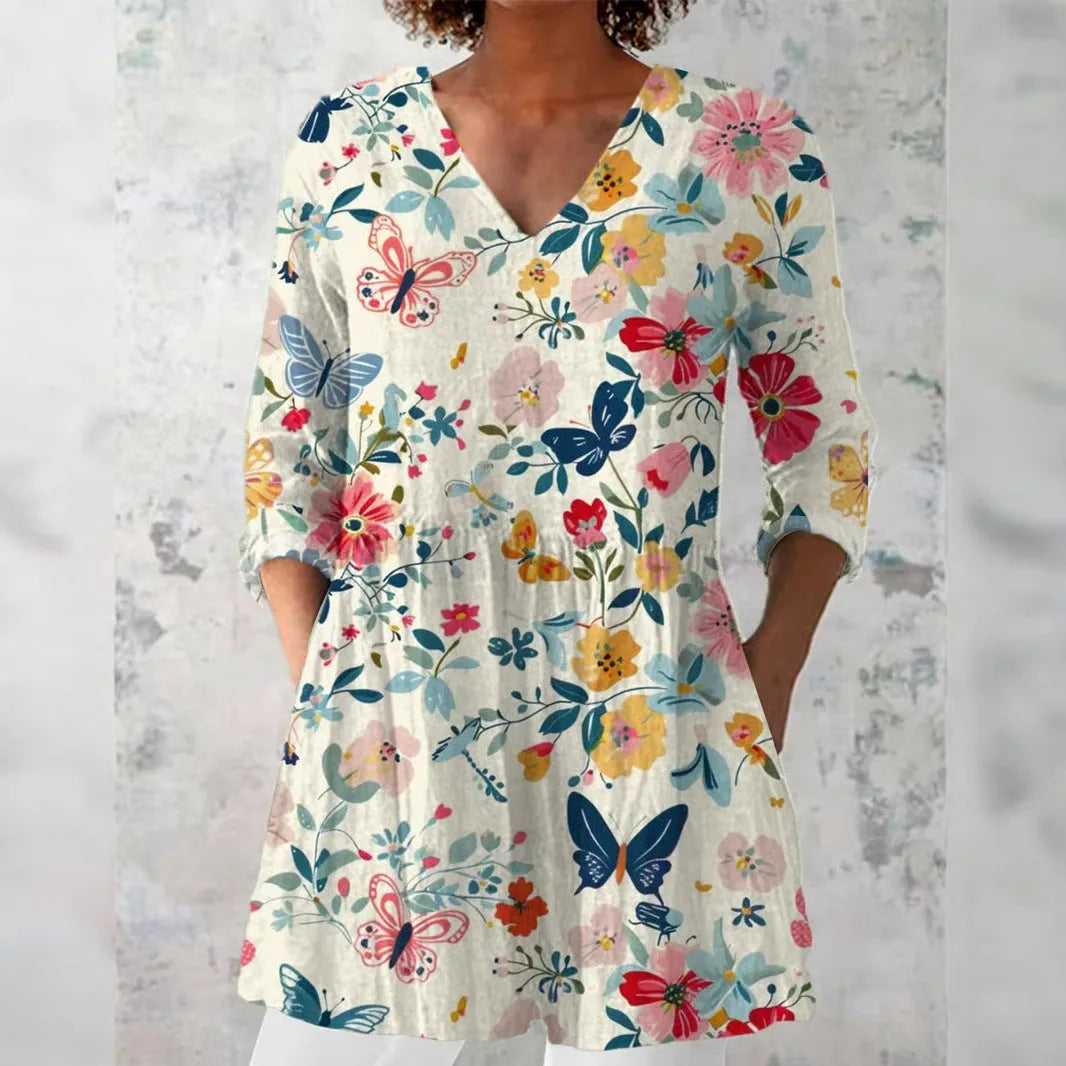 Women's slim-fit retro printed long-sleeved top in a solid colour on a hanger.