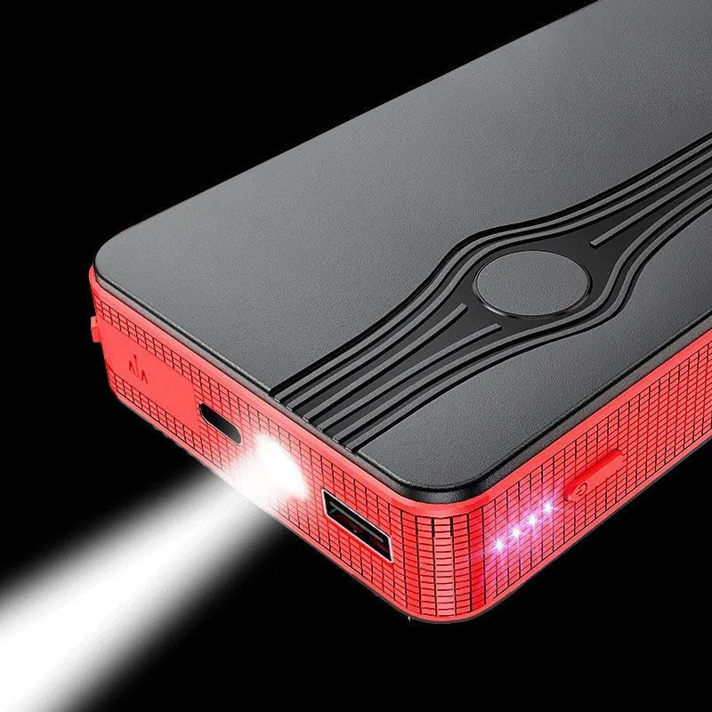 Red K4-E portable car jump starter and power bank unit with USB port and display.