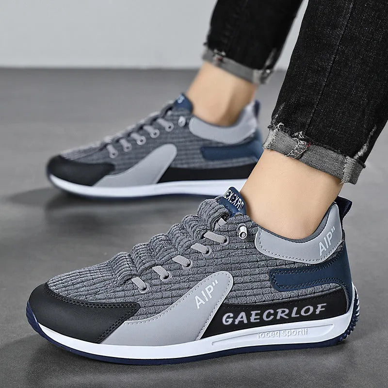 Men's green and grey mesh running shoes with lace-up front and viscose sole