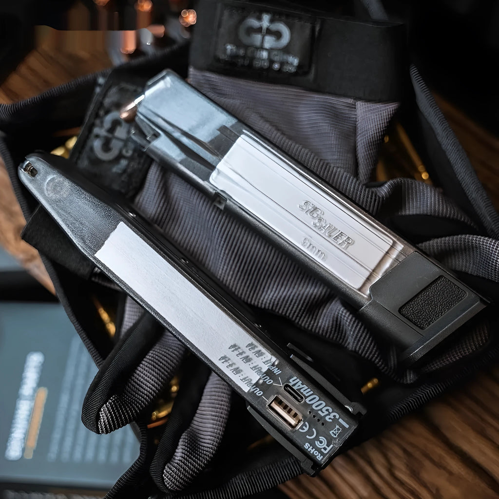 Transparent tactical power bank with decorative bullet clips showing 3500mAh PD3.0 charging