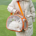Large transparent hard EVA cat backpack carrier in grass green colour, showing spacious interior.