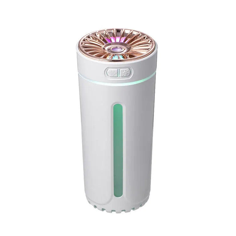 Black portable USB humidifier with colourful lights on a car cup holder.
