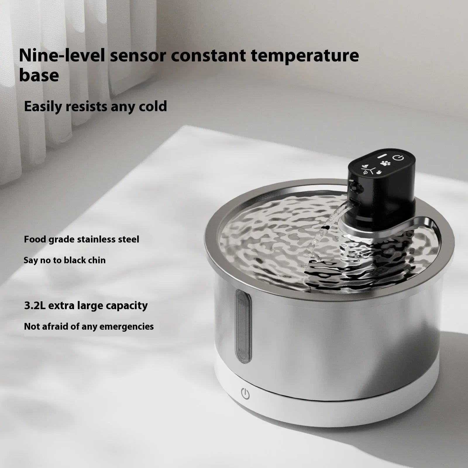 White stainless steel heated pet water fountain for cats and dogs on a countertop.