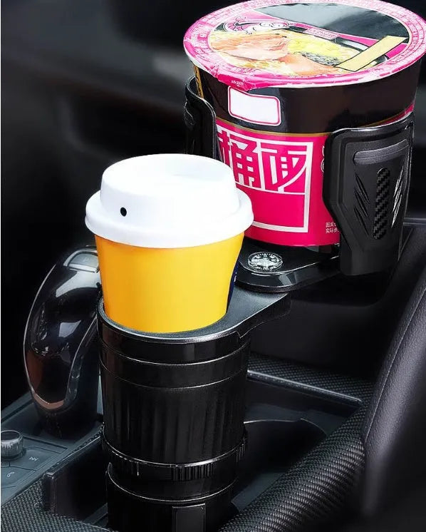 Carbon fibre black adjustable car cup holder with retractable base on a car centre console.