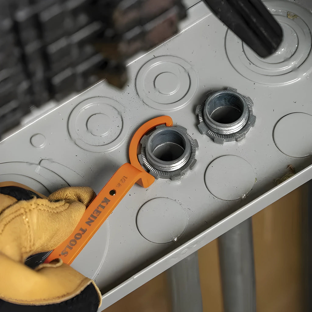 Orange, grey, and black magnetic suction wrenches laid out to show crescent, catheter locking, and standard spanner types.