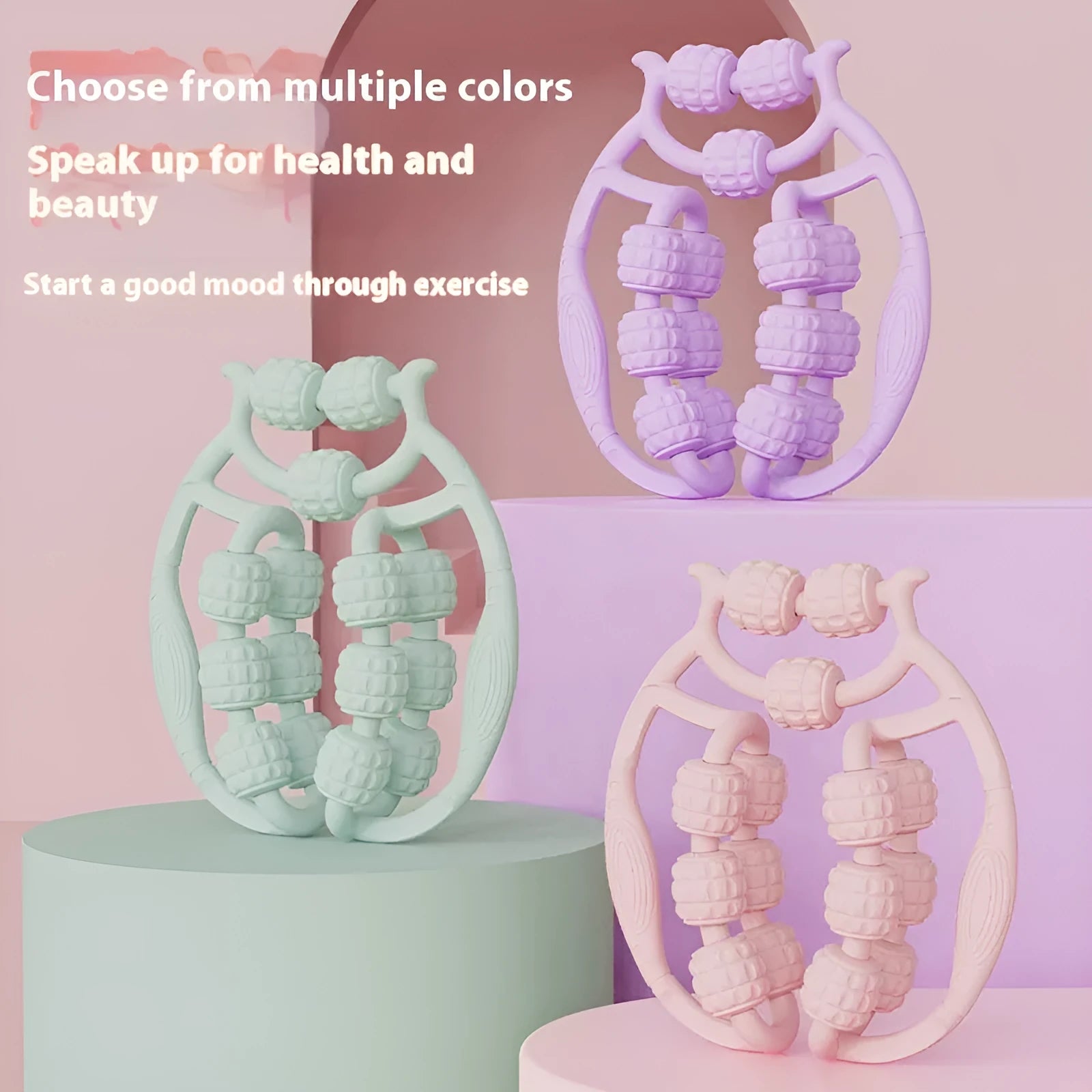 A handheld ring clip leg massage roller with double-row wheels, shown in coral pink.