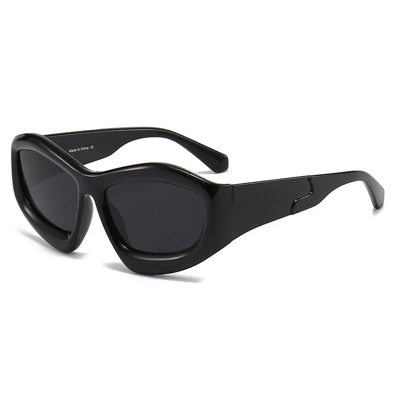 Concave shape sunglasses with bubble lens in multiple colour combinations including black, blue, red and yellow.