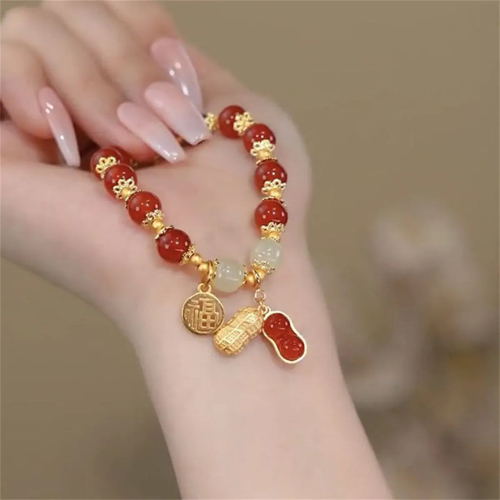 Peace buckle bracelet with rabbit motif, glass and coloured glaze beads