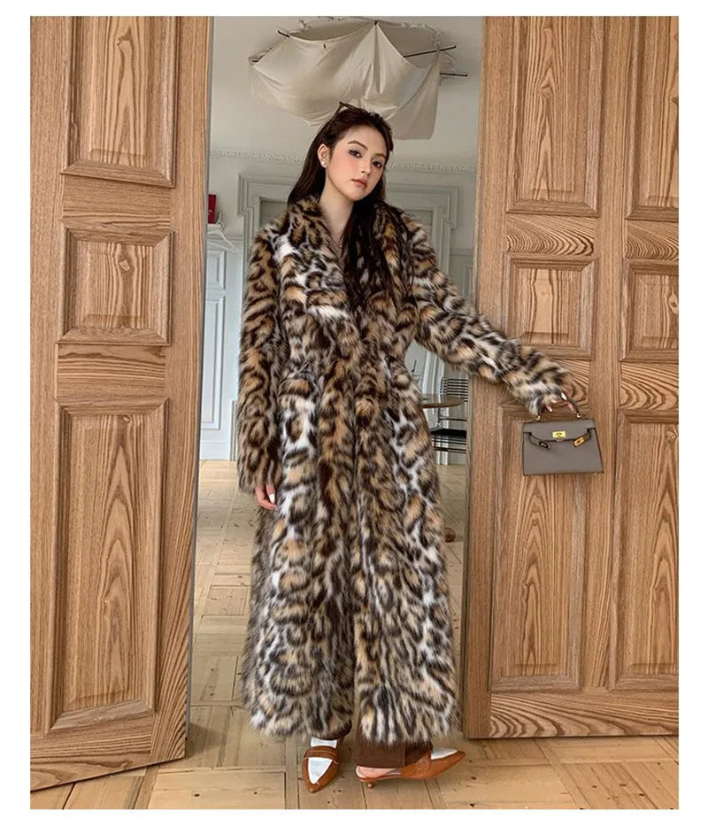 A woman's long faux fur coat with a fur collar and pockets, shown in a street fashion style.