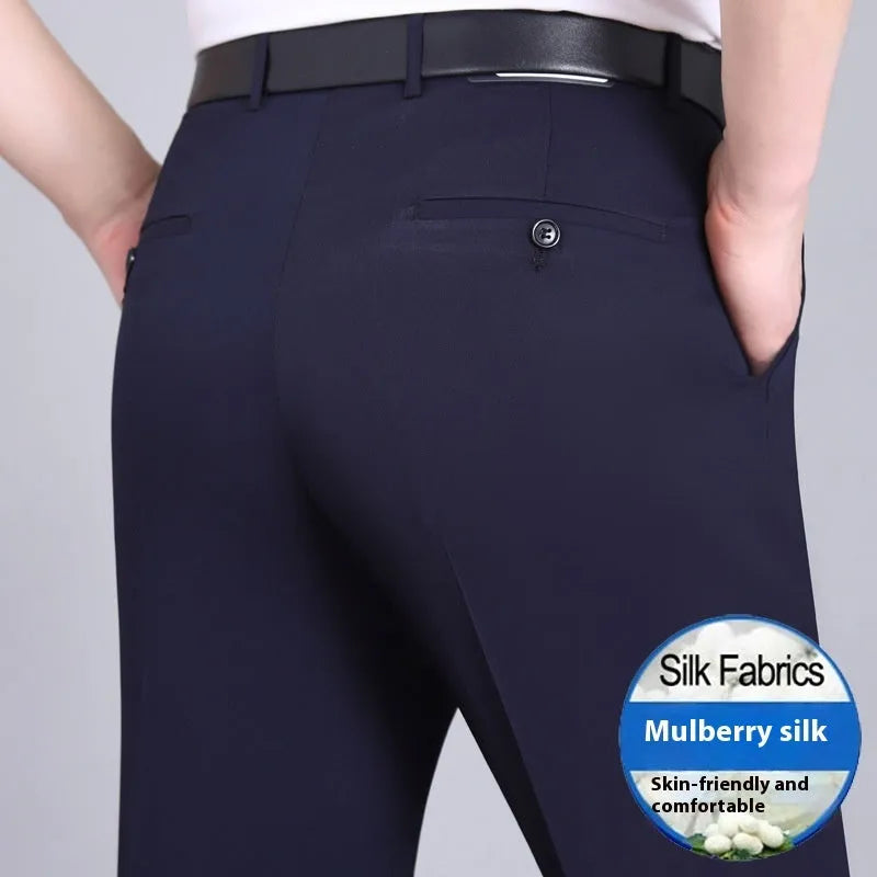 Men's straight-leg suit trousers in mulberry silk fabric on a hanger