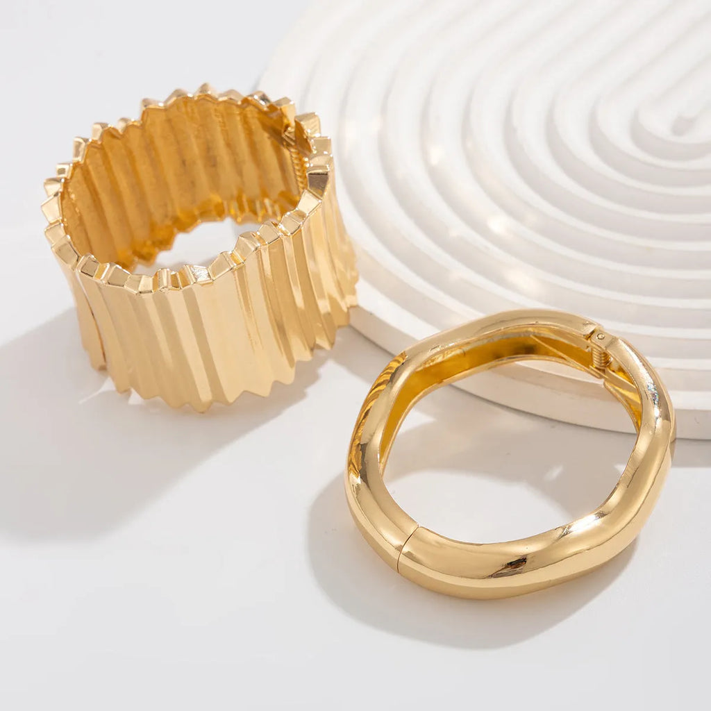 Punk metal texture ellipse pattern wide spring bracelet for women gold finish