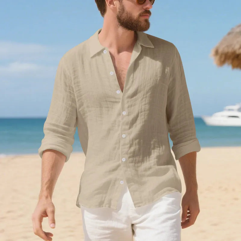 A man's loose-fitting casual linen shirt in a light colour, showcasing the non-iron style.