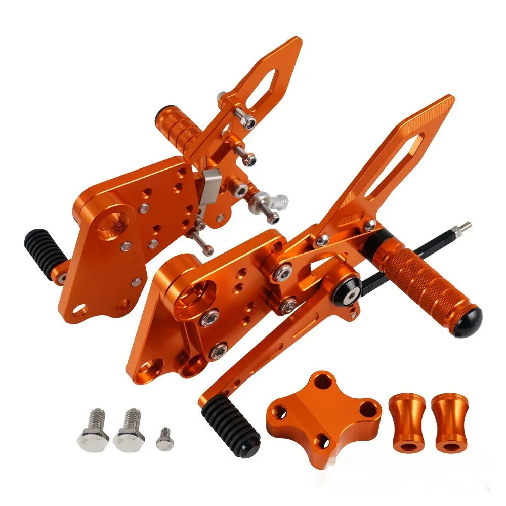KTM Duke rear shift pedal support assembly bracket in black or orange for 125 200 250 390 models