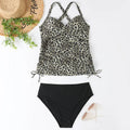 Women's black high-waisted backless bikini set for swimming on mannequin.