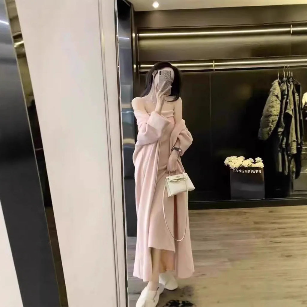Women's grey knitted cardigan and long skirt suit set with flocking texture detail.
