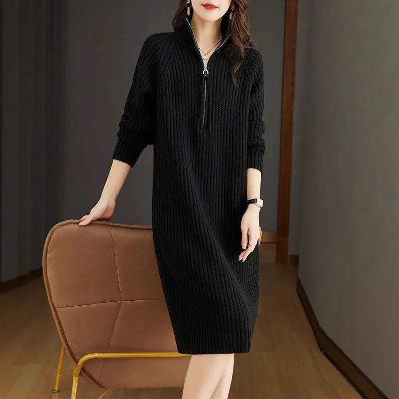 Beige casual women's skirt with half front zipper, stand collar, and long sleeves on a hanger.