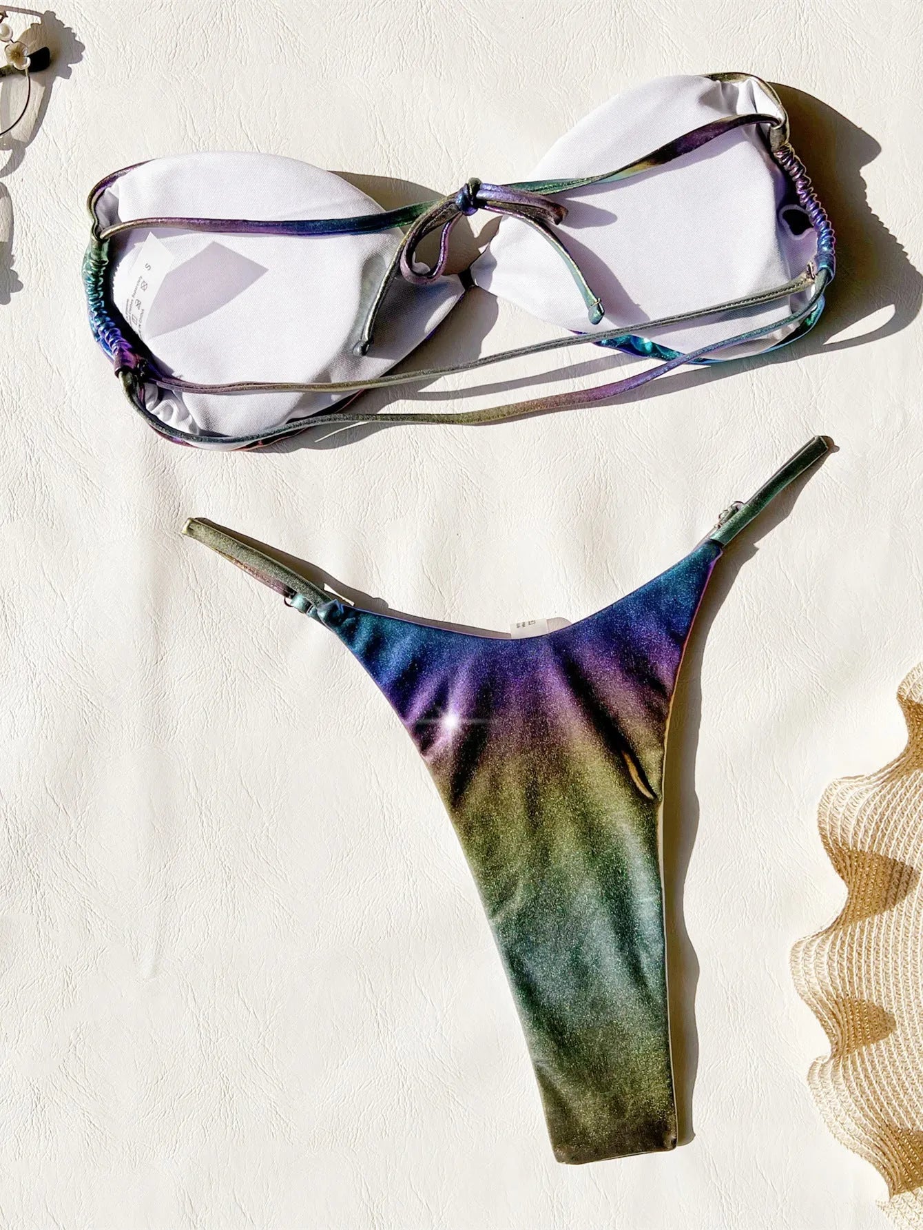 Women's gradient purple bikini swimsuit set on a white background