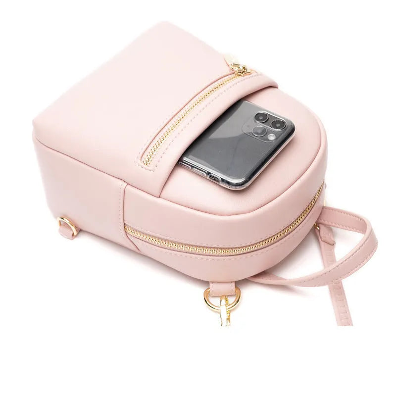 Soft PU mini backpack in street fashion design with contrast colour detailing and interior compartments