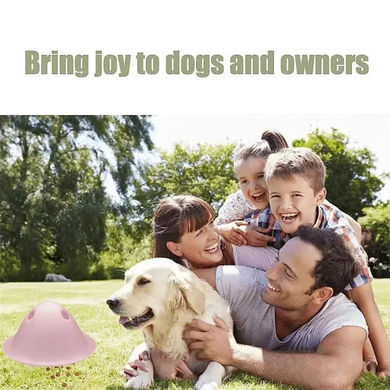 Green hidden treat dog chew toy with snack slots on a smooth surface for interactive puzzle play