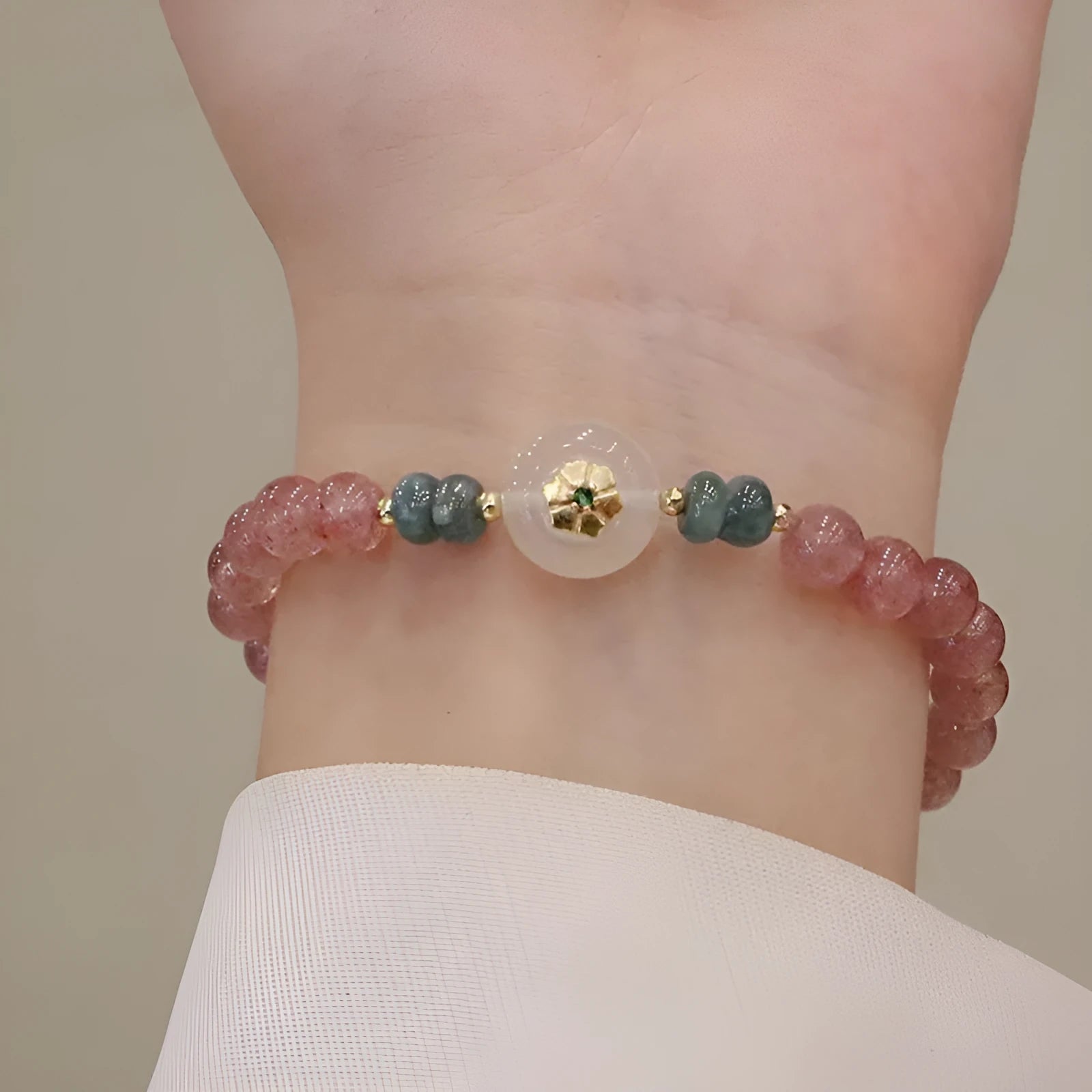 Women's strawberry quartz bracelet with blue water emerald round jade pendant geometric design