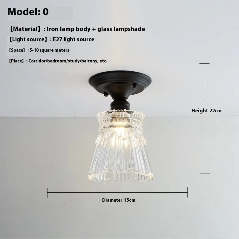 American retro single-head ceiling lamp with clear glass shade showing exposed filament style