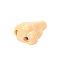 Flesh colour geometric plastic pencil sharpener with large nostril on a white background.