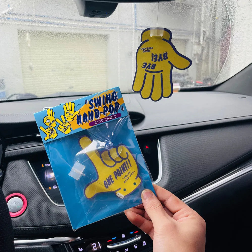 Cartoon swing hand car aromatic pendant with dynamic swing mechanism in various colours
