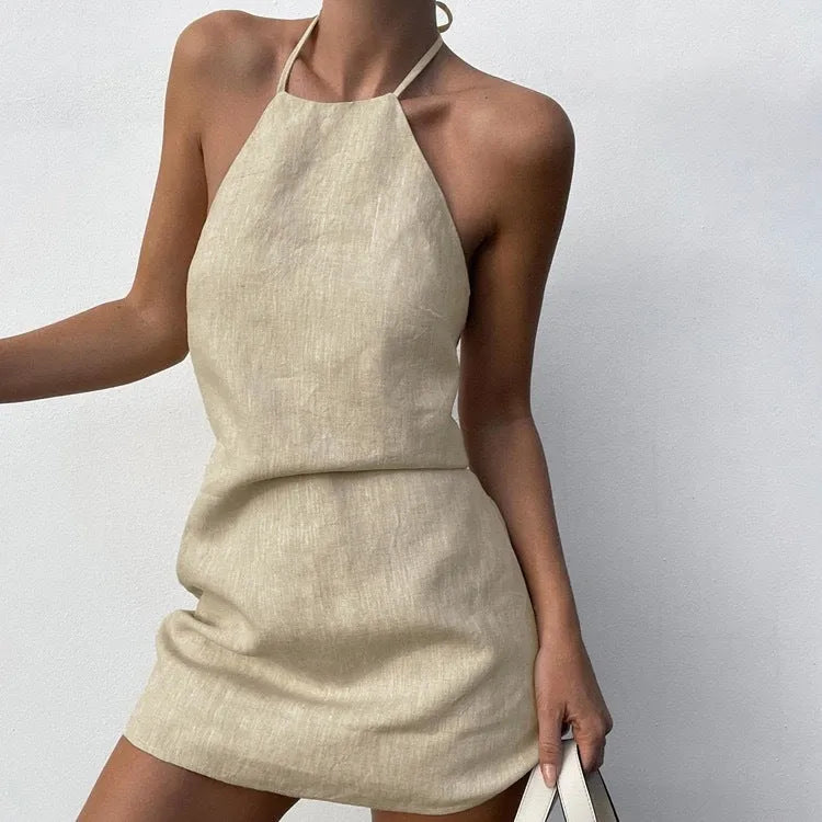 Solid colour linen A-line dress for women on a hanger.